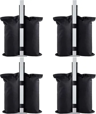 Four sets of black sandbags attached to gray poles, arranged in a grid.