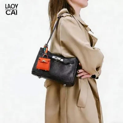 Produktbild von Mini-Münzgeldbörse als Taschen- und Schlüsselanhänger für Damen, Mini-Handtasche mit Reißverschluss und Make-up-Tasche