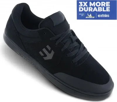 A black Etnies skate shoe is shown from a slightly elevated side angle against a white background.