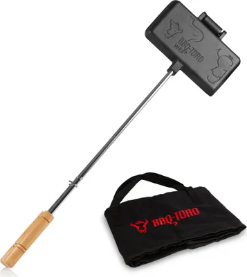 A BBQ-Toro sandwich iron with a long handle and a black transport bag, displayed on a white background.