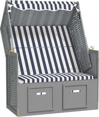 A beach chair with a striped canopy and cushions.