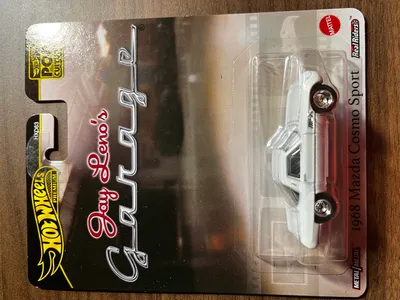 Produktbild von Hot Wheels Premium Pop Culture - 1968 Mazda Cosmo Sport – Jay Leno’s Garage Die-Cast Model Car 1:64, Mattel JBL66