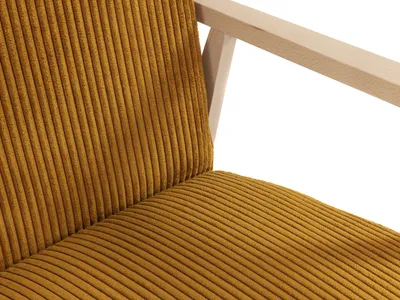 A close-up view of a mustard yellow corduroy armchair, showing the texture of the fabric and a light wood armrest.