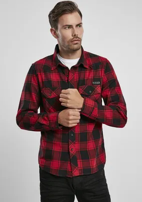 A man wearing a red and black checkered shirt.