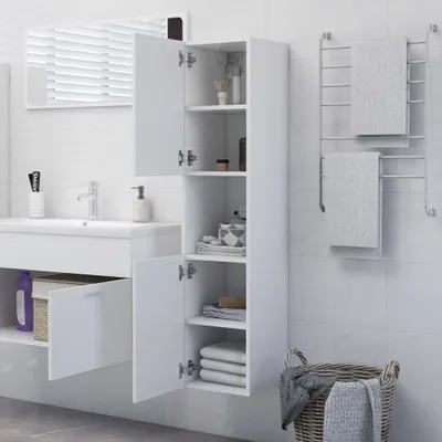 A bathroom scene with a sink, cabinet, and towel rack.
