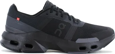 A studio shot of a single black running shoe.