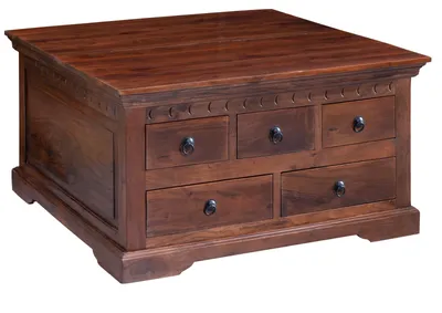 A wooden coffee table with drawers.