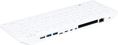 A white keyboard with various ports on the side.