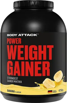 A black tub of Body Attack Power Weight Gainer supplement with banana flavor.