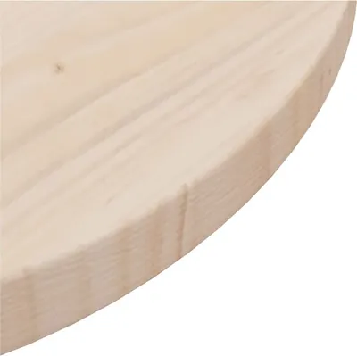 A close-up view of the edge of a round wooden tabletop.