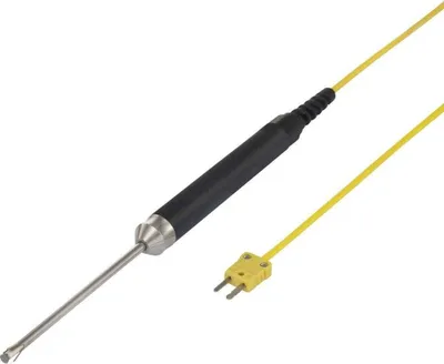 A thermocouple temperature probe with a black handle and a silver tip, connected to a yellow cable with a K-type connector, is shown against a white background.