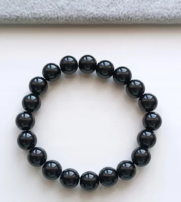 Image de BRACELET ÉLASTIQUE NOIR AVEC PIERRE ONYX 10 mm