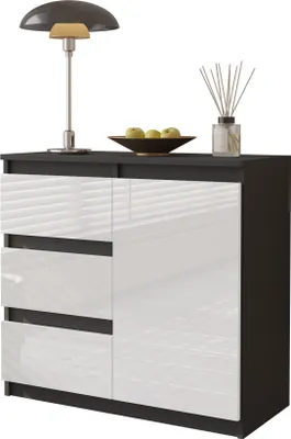 A modern sideboard with a dark gray frame and white gloss drawers and door, displayed on a white background. A lamp, a bowl of apples, and a diffuser are placed on top.