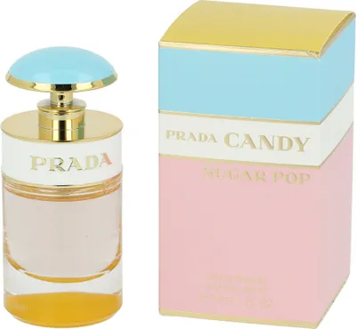 A perfume bottle and its box are displayed side-by-side against a white background.