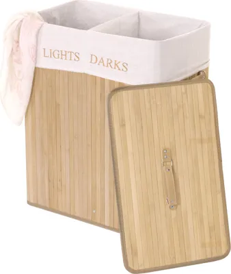 A laundry basket with two compartments and a lid, made of bamboo.