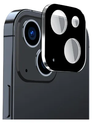 A close-up shot of a smartphone camera lens protector on a dark smartphone.