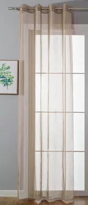 A sheer curtain hanging on a window rod.