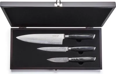 A set of three kitchen knives in a wooden box.