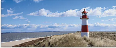 Produktbild von ARTland Glasbild Leuchtturm Sylt Größe: 125x50 cm