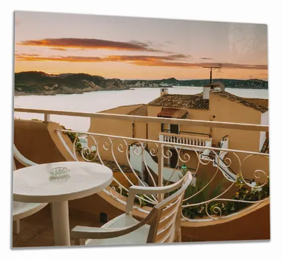 Produktbild von Wallario Herdabdeckplatte aus Glas, Größe 60 x 52 cm 1-teilig, Motiv Sommer in Spanien - Ausblick von einer schönen Terrasse auf das Meer