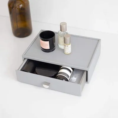 Immagine prodotto di Toeletta grigia con cassetto e piano di lavoro per il trucco
