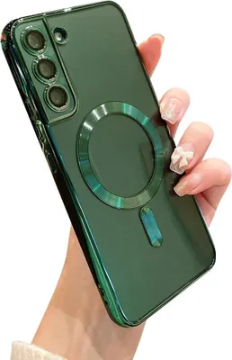 A hand holding a green phone case with a magnetic ring on the back.
