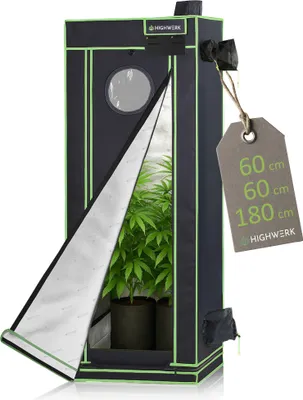 A grow tent with plants inside, shown from the front with the door open.