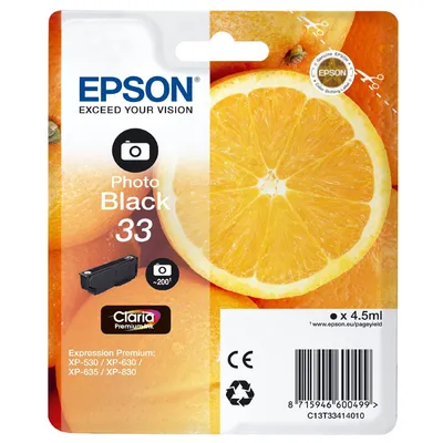 The image shows the packaging of an Epson ink cartridge with oranges in the background.