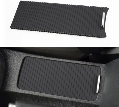 Produktbild von Getränkehalter-Abdeckung mit Schieberollo für die Mittelkonsole von Golf 5 und Golf 6 2009–2014 sowie Sagitar und Scirocco 2006–2011