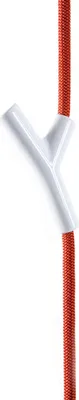A red cord passes through a white Y-shaped object.