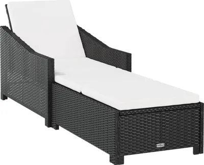 A black rattan chaise lounge with a white cushion, shown against a white background.