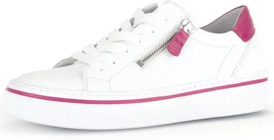 A white sneaker with pink accents is shown against a white background.