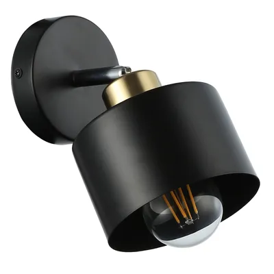 A black and gold wall lamp with a clear glass bulb.