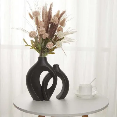 Zdjęcie produktu dla Czarny ceramiczny wazon na kwiaty – nowoczesna, elegancka dekoracja