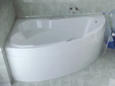 Produktbild von BADLAND Eckbadewanne Badewanne Ada LINKS 140x90 mit Acrylschürze, Füßen und Ablaufgarnitur GRATIS