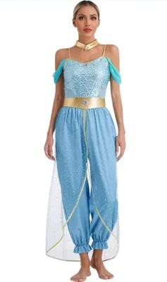 A woman is modeling a blue and gold Arabian princess costume.