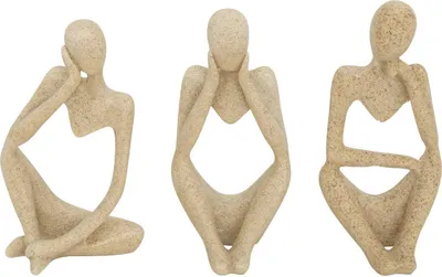 Three beige abstract statues of seated figures, each in a different contemplative pose, are displayed against a white background.
