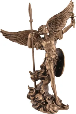 A bronze statue of an angel holding a spear and a torch, with a shield on its back, standing on a cloud-like base.
