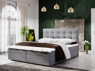 A bedroom scene featuring a bed with storage.