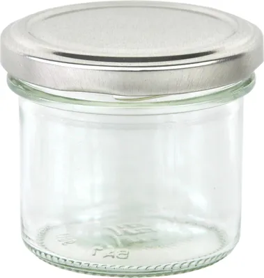 A clear glass jar with a silver lid, isolated on a white background.