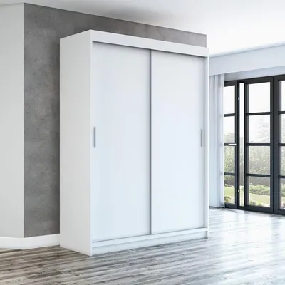 A white sliding door wardrobe is shown in a room with a grey wall and wooden floor.