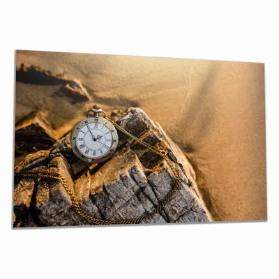 Produktbild von Wallario Herdabdeckplatte aus Glas, Größe 80 x 52 cm 1-teilig, Motiv Alte Taschenuhr am Strand