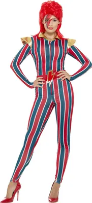 A woman is posing in a costume.