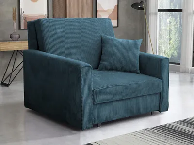 A blue corduroy sofa is shown in a living room setting.