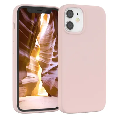 A pink iPhone case is shown with a canyon landscape as the phone's wallpaper.