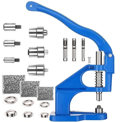 A blue eyelet press tool set with various accessories laid out on a white background.