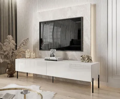 Modern living room with a wall-mounted TV and entertainment console.