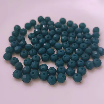 Produktbild von Glasperlen - Typ 'Facettiert' - 100 Stück - 6 mm - Türkis dunkel matt