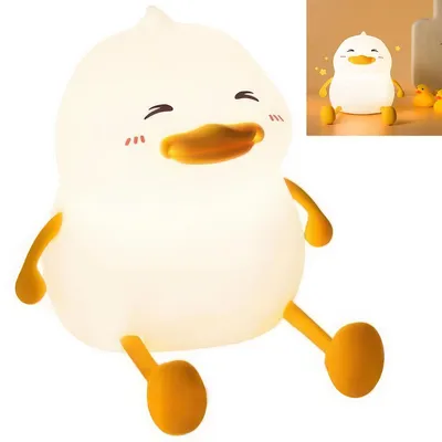 A cute, glowing duck-shaped night light sits on a white background, with a smaller inset image showing the same duck light in a different setting.