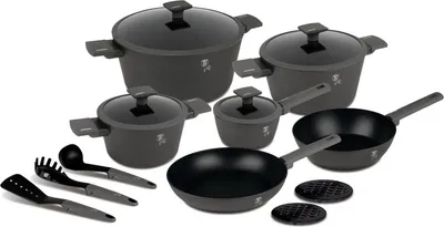 A collection of cookware and kitchen utensils arranged on a white background.
